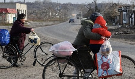pessoas em bicicleta